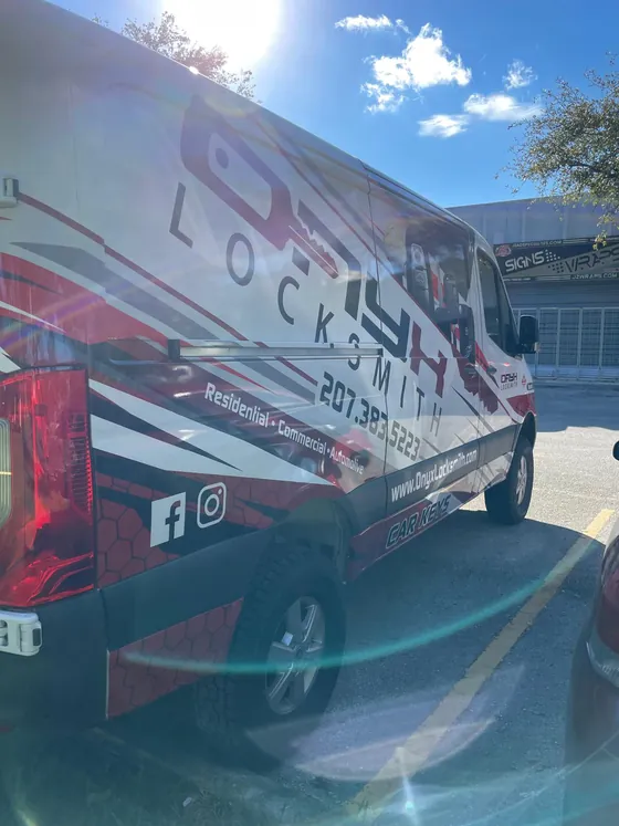 The side of an Onyx van on a sunny day